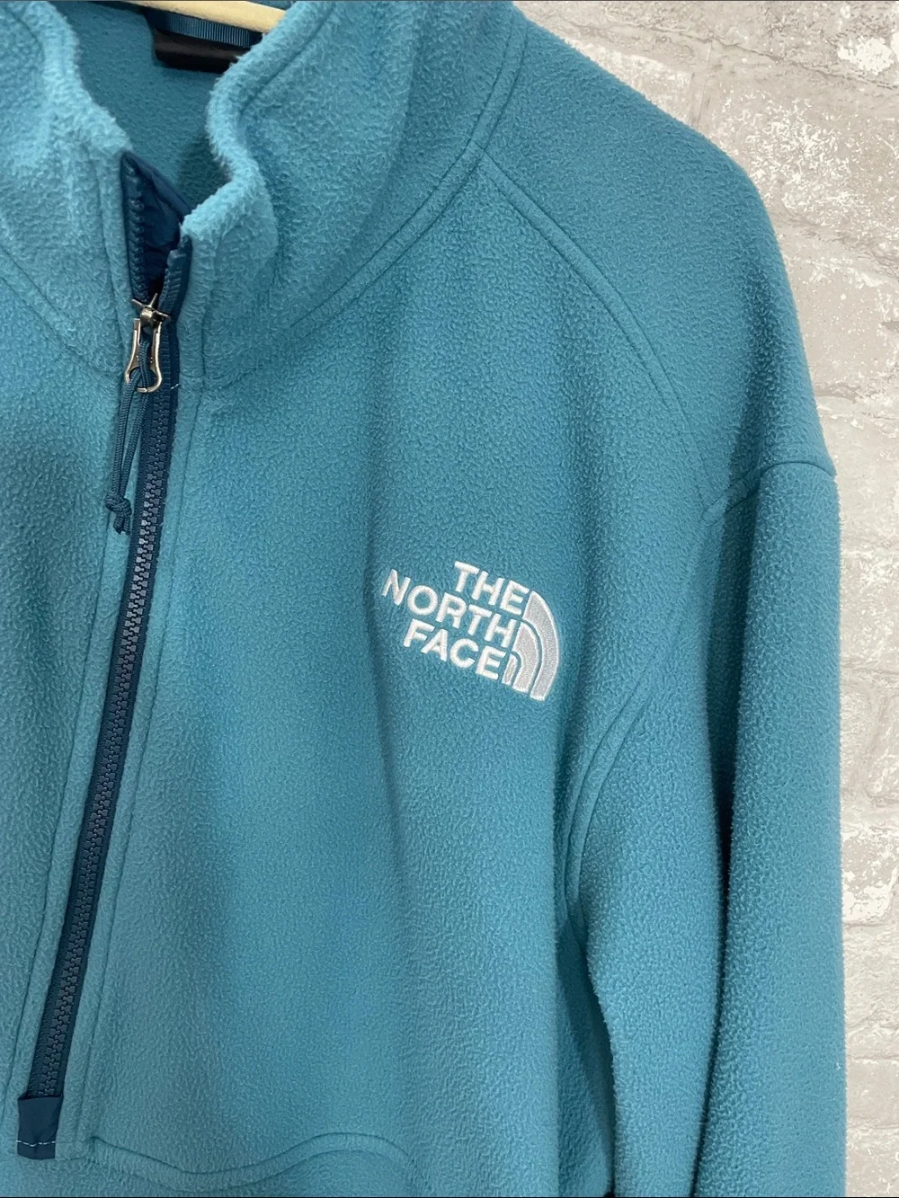 The North Face Men’s Teal Half-Zip Fleece Pullover with Dark Teal Accents